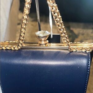 Elegant Navy Blue Handbag with Gold Accents